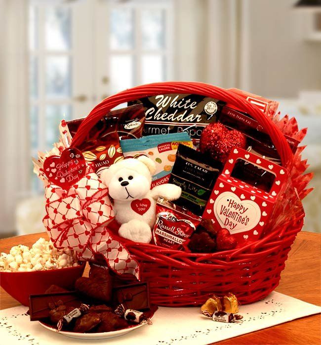Valentine Day gift basket for her with chocolates, skincare, and romantic accessories